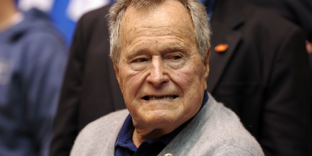 DURHAM, NC - JANUARY 18: Former U.S. President George H.W. Bush looks on during a game between the North Carolina State Wolfpack and the Duke Blue Devils at Cameron Indoor Stadium on January 18, 2014 in Durham, North Carolina. Duke defeated NC State 95-60. (Photo by Lance King/Getty Images)