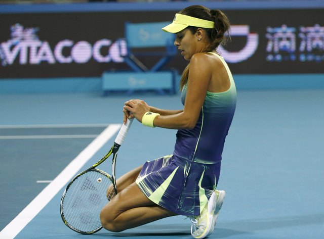 Ana Ivanovic of Serbia reacts during a women's singles match against Venus Williams of U.S. at the China Open tennis tournament in Beijing, China, October 6, 2015. REUTERS/Kim Kyung-Hoon