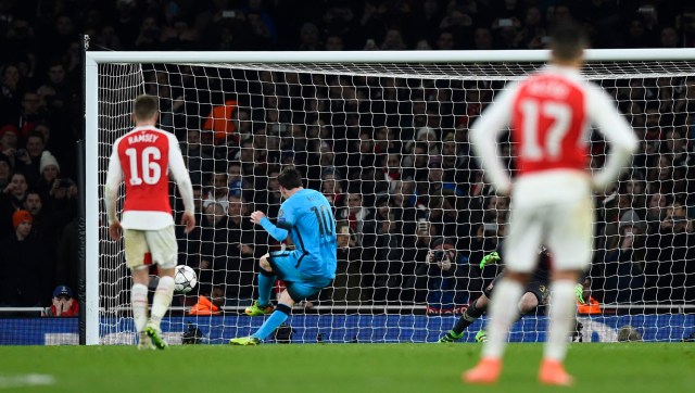 Football Soccer - Arsenal v FC Barcelona - UEFA Champions League Round of 16 First Leg - Emirates Stadium, London, England - 23/2/16 Lionel Messi scores the second goal for Barcelona from the penalty spot Reuters / Dylan Martinez Livepic EDITORIAL USE ONLY.