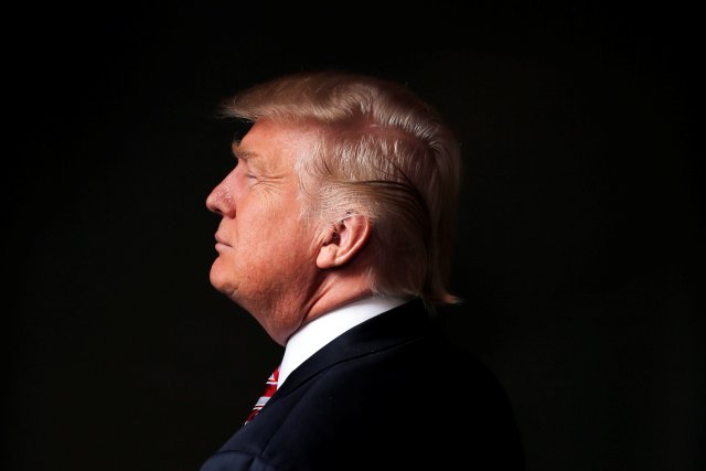 Republican U.S. presidential candidate Donald Trump poses for a photo after an interview with Reuters in his office in Trump Tower, in the Manhattan borough of New York City, U.S., May 17, 2016. REUTERS/Lucas Jackson