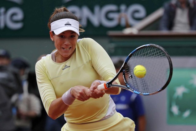 Tennis - French Open Women's Singles Final match - Roland Garros - Serena Williams of the U.S. vs Garbine Muguruza of Spain - Paris, France - 04/06/16. Garbine Muguruza returns the ball. REUTERS/Benoit Tessier