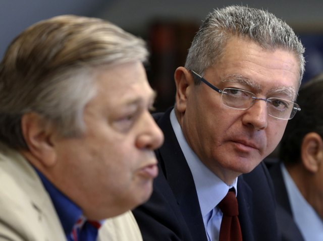 El abogado y exministro de Justicia, Alberto Ruiz Gallardón, junto a Leopoldo López padre