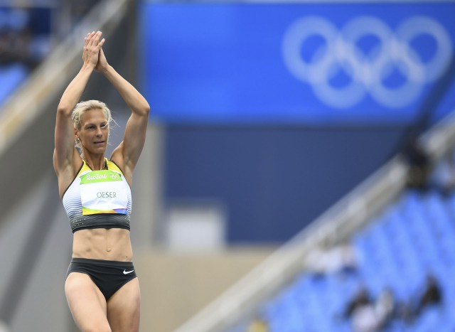 2016 Rio Olympics - Athletics - Women's Heptathlon High Jump - Groups - Olympic Stadium - Rio de Janeiro, Brazil - 12/08/2016. Jennifer Oeser (GER) of Germany reacts REUTERS/Dylan Martinez FOR EDITORIAL USE ONLY. NOT FOR SALE FOR MARKETING OR ADVERTISING CAMPAIGNS.