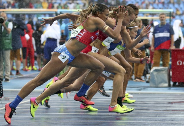 2016 Rio Olympics - Athletics - Women's Heptathlon 100m Hurdles - Olympic Stadium - Rio de Janeiro, Brazil - 12/08/2016. Alysbeth Felix (PUR) of Puerto Rico (9) competes with other athletes. REUTERS/Gonzalo Fuentes FOR EDITORIAL USE ONLY. NOT FOR SALE FOR MARKETING OR ADVERTISING CAMPAIGNS.