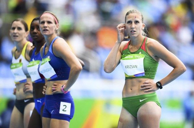 2016 Rio Olympics - Athletics - Women's Heptathlon 100m Hurdles - Olympic Stadium - Rio de Janeiro, Brazil - 12/08/2016. Xenia Krizsan (HUN) of Hungary reacts. REUTERS/Dylan Martinez FOR EDITORIAL USE ONLY. NOT FOR SALE FOR MARKETING OR ADVERTISING CAMPAIGNS.