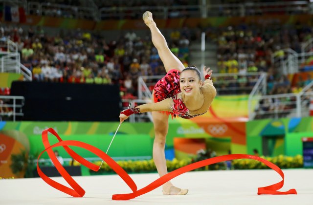 2016 Rio Olympics - Rhythmic Gymnastics - Preliminary - Individual All-Around Qualification - Rotation 3 - Rio Olympic Arena - Rio de Janeiro, Brazil - 19/08/2016. Son Yeon-Jae (KOR) of South Korea competes using the ribbon. REUTERS/Mike Blake FOR EDITORIAL USE ONLY. NOT FOR SALE FOR MARKETING OR ADVERTISING CAMPAIGNS.