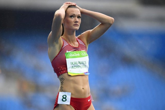 2016 Rio Olympics - Athletics - Women's Heptathlon 100m Hurdles - Olympic Stadium - Rio de Janeiro, Brazil - 12/08/2016. Laura Ikauniece-Admidina (LAT) of Latvia reacts REUTERS/Dylan Martinez FOR EDITORIAL USE ONLY. NOT FOR SALE FOR MARKETING OR ADVERTISING CAMPAIGNS.