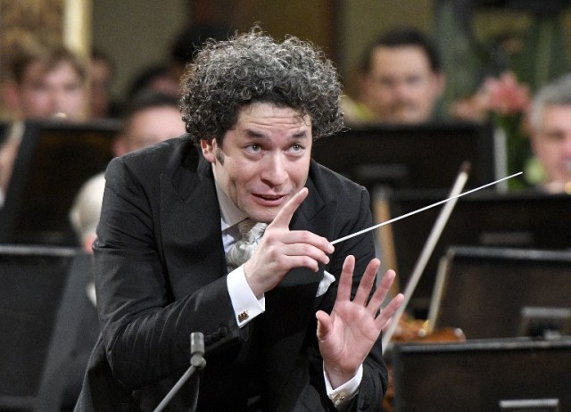 Venezulean conductor Gustavo Dudamel conducts the traditional New Year's Concert 2017 with the Vienna Philharmonic Orchestra at the Vienna Musikverein in Vienna, Austria, on January 1, 2017. / AFP PHOTO / APA / HERBERT NEUBAUER / Austria OUT