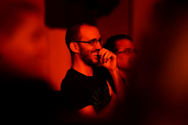 People watch Venezuelan comedian Veronica Gomez perform stand-up comedy at the theater of the BOD Cultural Center in Caracas on December 9, 2016. Although basic goods may be lacking in crisis-stricken Venezuela, what is not in short supply is humor, not only as a form of evasion but also as a way to channel criticism against the government of Nicolás Maduro. / AFP PHOTO / FEDERICO PARRA / TO GO WITH AFP STORY BY CAROLA SOLE