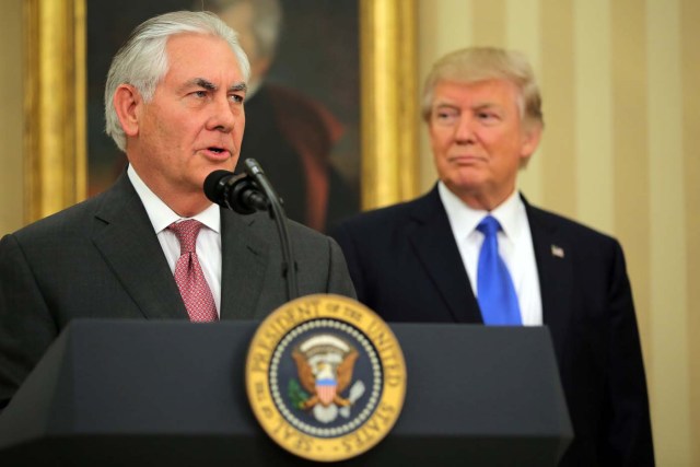 New U.S. Secretary of State Rex Tillerson speaks after his swearing-in ceremony, accompanied by U.S. President Donald Trump at the Oval Office of the White House in Washington, DC, U.S., February 1, 2017. REUTERS/Carlos Barria