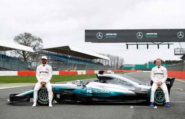 Britain Formula One - F1 - 2017 Mercedes Formula One Car Launch - Silverstone - 23/2/17 Mercedes' Lewis Hamilton and Valtteri Bottas pose during the launch Reuters / Eddie Keogh Livepic EDITORIAL USE ONLY.