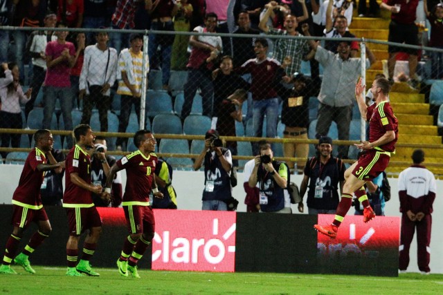 Football Soccer - Venezuela v Peru - World Cup 2018 Qualifier - Monumental Stadium, Maturin, Venezuela - 23/3/17 - Venezuela's Mikel Villanueva (3) celebrates with team mates after scoring. REUTERS/Marco Bello