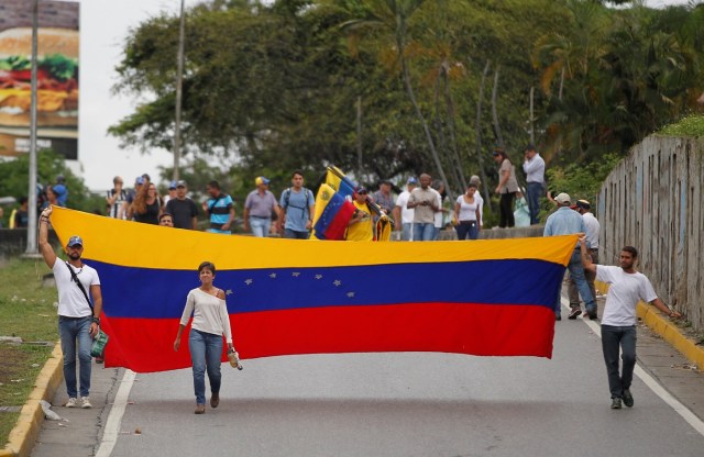 Opposition supporters rally against President Nicolas Maduro in Caracas, Venezuela May 3, 2017. REUTERS/Christian Veron