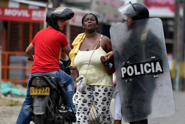 AFP PHOTO / Christian ESCOBAR / Protestas en Colombia