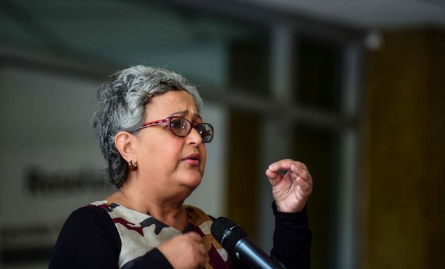 The head of Venezuela's National Electoral Council (CNE) Tibisay Lucena, speaks during a press conference in Caracas, on July 25, 2017. On Sunday things between the two sides are expected to come to a head. That's when Maduro is to hold a controversial election to choose 545 members for a body called the Constituent Assembly, tasked with rewriting the constitution drafted under his late predecessor Hugo Chavez. / AFP PHOTO / RONALDO SCHEMIDT