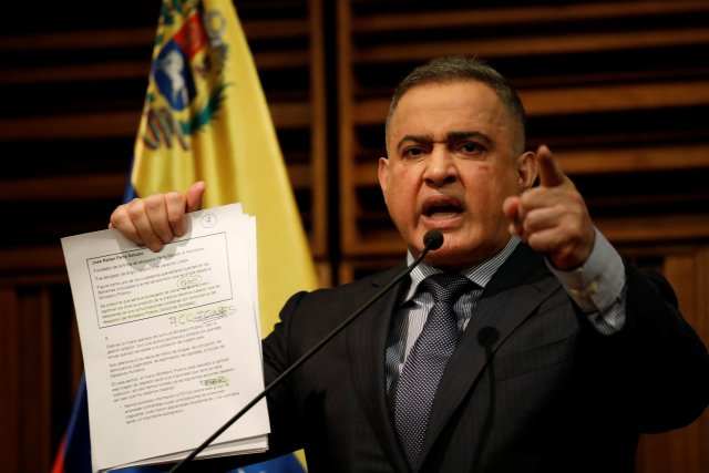 Venezuela's chief prosecutor Tarek William Saab shows documents during a news conference in Caracas, Venezuela, August 31, 2017. REUTERS/Andres Martinez Casares