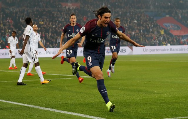 Soccer Football - Ligue 1 - Paris St Germain vs OGC Nice - Parc des Princes, Paris, France - October 27, 2017   Paris Saint-Germain’s Edinson Cavani celebrates scoring their first goal    REUTERS/Gonzalo Fuentes