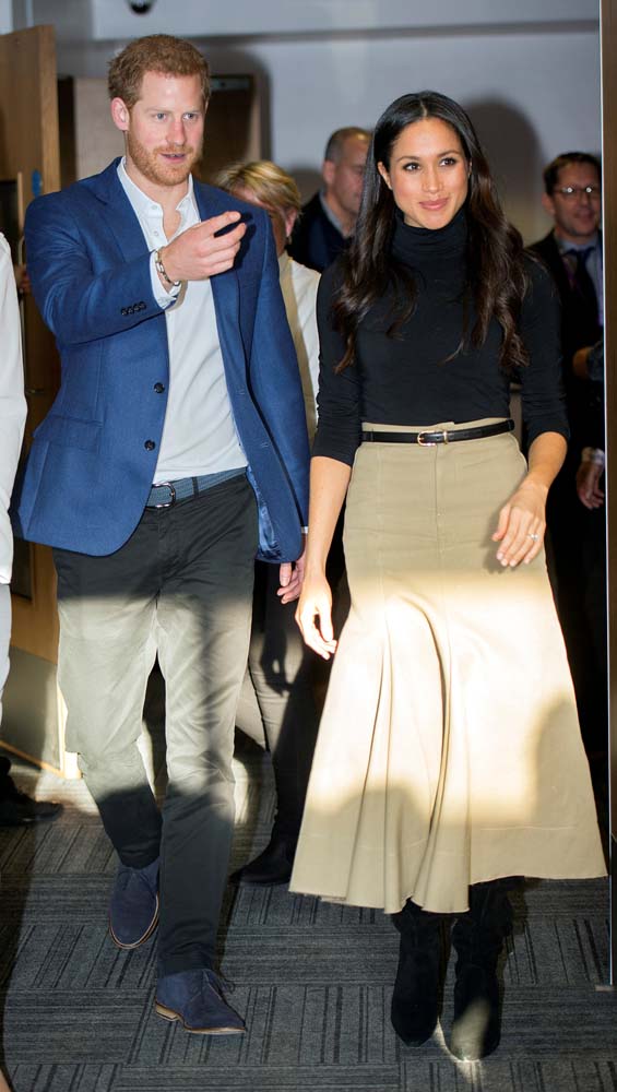 Britain's Prince Harry and his fiancee Meghan Markle visit the Nottingham Academy school in Nottingham, Britain, December 1, 2017. REUTERS/Andy Stenning/Pool