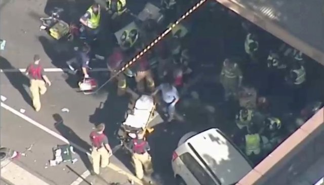 ATTENTION EDITORS - VISUAL COVERAGE OF SCENES OF INJURY OR DEATH Police and emergency services attend to the scene of an incident involving a vehicle on Flinders Street, as seen from Swanson Street, in Melbourne, Australia December 21, 2017. NINE NETWORK/Reuters TV via REUTERS ATTENTION EDITORS - THIS IMAGE WAS PROVIDED BY A THIRD PARTY. NO RESALES. NO ARCHIVE. AUSTRALIA OUT. NEW ZEALAND OUT. PAPUA NEW GUINEA OUT.