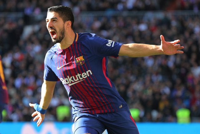 Soccer Football - La Liga Santander - Real Madrid vs FC Barcelona - Santiago Bernabeu, Madrid, Spain - December 23, 2017   Barcelona’s Luis Suarez celebrates scoring their first goal    REUTERS/Sergio Perez