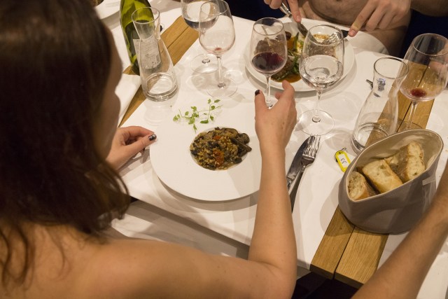 EDITORS NOTE: Graphic content / Diners eat in the nude at the newly opened nudist restaurant "o'naturel" in Paris on December 5, 2017. Leave your coats, your pants and your inhibitions at the door: a Paris restaurant has begun serving up classic French fare to diners in the nude. Located down a quiet side street in southwest Paris, O'naturel, billed as the French capital's first nudist restaurant, is the brainchild of 42-year-old twins Mike and Stephane Saada.  / AFP PHOTO / GEOFFROY VAN DER HASSELT / RESTRICTED TO EDITORIAL USE - TO ILLUSTRATE THE EVENT AS SPECIFIED IN THE CAPTION