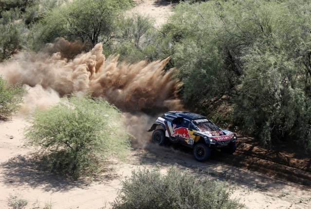 Dakar Rally - 2018 Peru-Bolivia-Argentina Dakar rally - 40th Dakar Edition stage thirteen, San Juan to Cordoba - January 19, 2018. Carlos Sainz of Spain and co-pilot Lucas Cruz of Spain drive their Peugeot. REUTERS/Andres Stapff