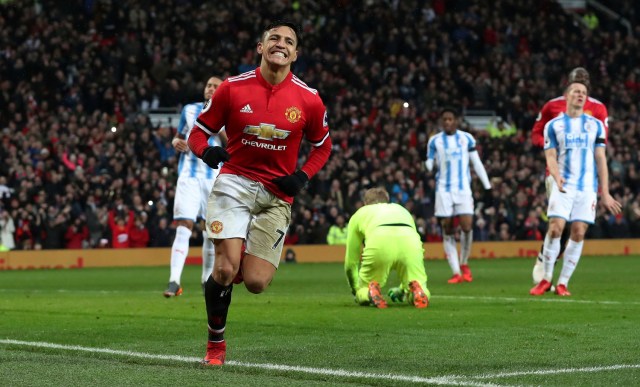 Soccer Football - Premier League - Manchester United vs Huddersfield Town - Old Trafford, Manchester, Britain - February 3, 2018   Manchester United’s Alexis Sanchez celebrates scoring their second goal    REUTERS/Scott Heppell    EDITORIAL USE ONLY. No use with unauthorized audio, video, data, fixture lists, club/league logos or "live" services. Online in-match use limited to 75 images, no video emulation. No use in betting, games or single club/league/player publications.  Please contact your account representative for further details.     TPX IMAGES OF THE DAY