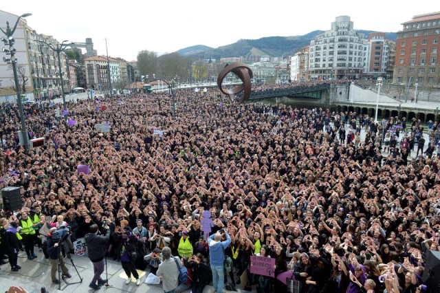 Protesters form triangles with their hands during a demonstration for women's rights in Bilbao, Spain, March 8, 2018, on International Women's Day. REUTERS/Vincent West