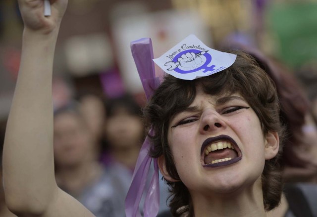 A woman takes part in a demonstration for women's rights on International Women's Day in Oviedo, Spain March 8, 2018. REUTERS/Eloy Alonso