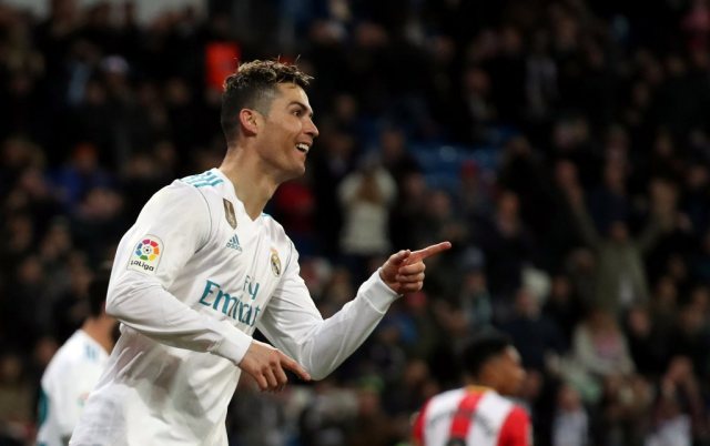 Soccer Football - La Liga Santander - Real Madrid vs Girona - Santiago Bernabeu, Madrid, Spain - March 18, 2018   Real Madrid's Cristiano Ronaldo celebrates scoring their sixth goal   REUTERS/Sergio Perez