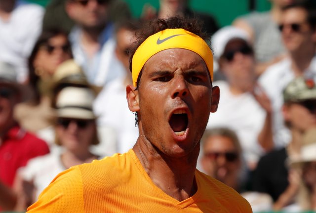 Tennis - ATP - Monte Carlo Masters - Monte-Carlo Country Club, Monte Carlo, Monaco - April 22, 2018 Spain's Rafael Nadal celebrates winning the first set during the final match against Japan's Kei Nishikori REUTERS/Eric Gaillard