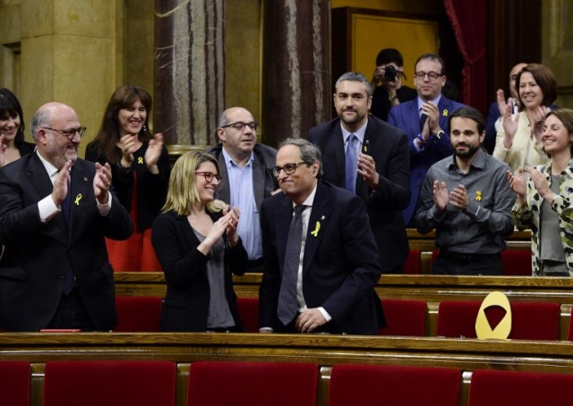 / AFP PHOTO / LLUIS GENE