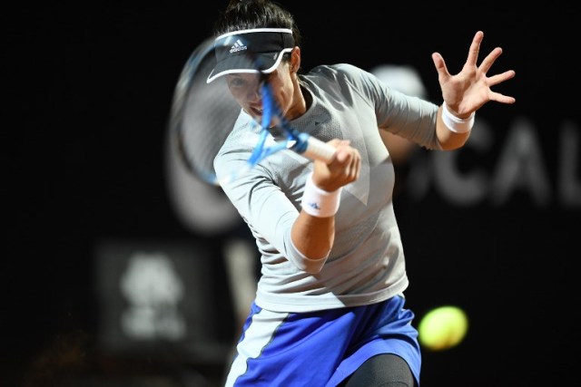 España Garbine Muguruza vuelve a Australia Daria Gavrilova durante el torneo Open Tennis WTA de Roma en el Foro Italico, el 16 de mayo de 2018 en Roma. / AFP PHOTO / FILIPPO MONTEFORTE