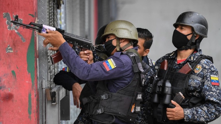 Venezuelan police move in on gang-run Caracas neighbourhoods