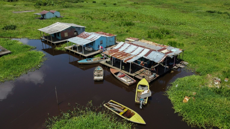 In Venezuela, a village on stilts slowly succumbs to mud