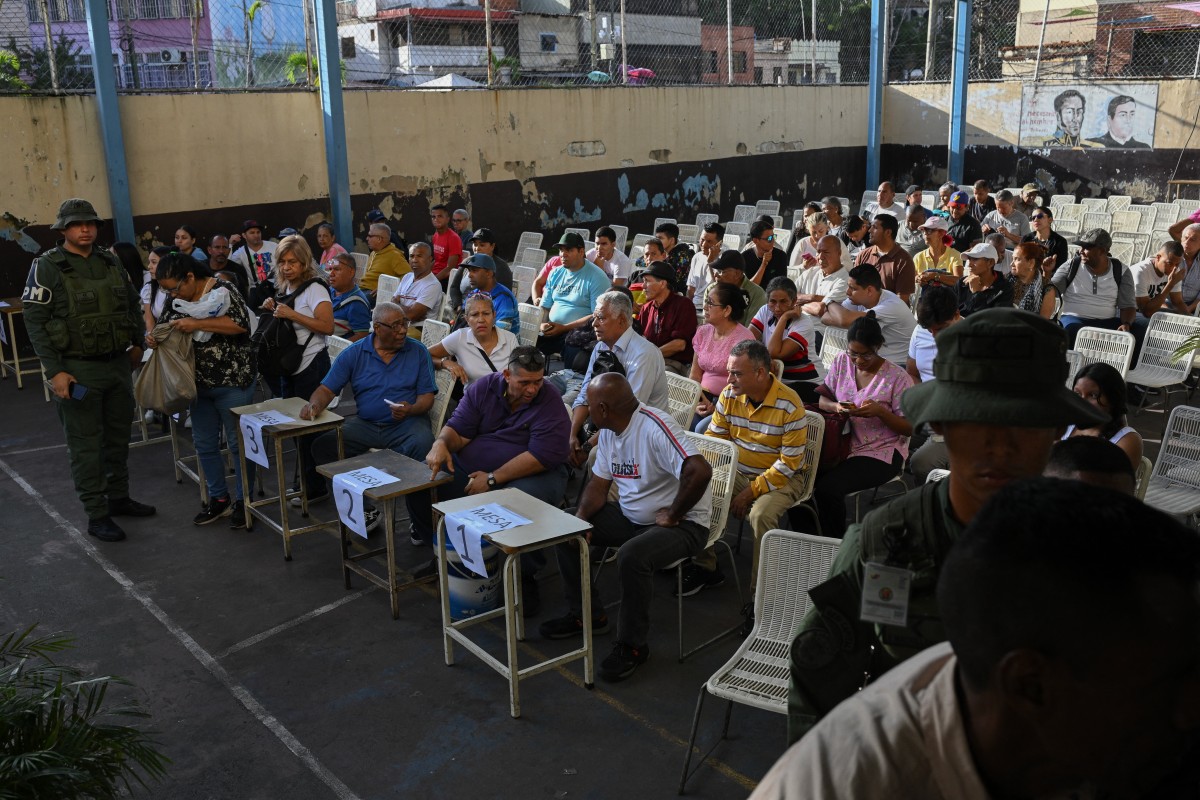 AFP: Venezuela decide entre continuidad o cambio en una tensa elección presidencial (Fotos)